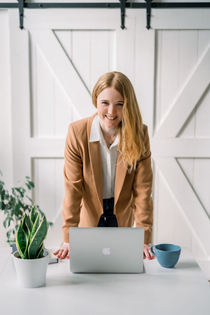 sam nelmes with laptop digital marketing